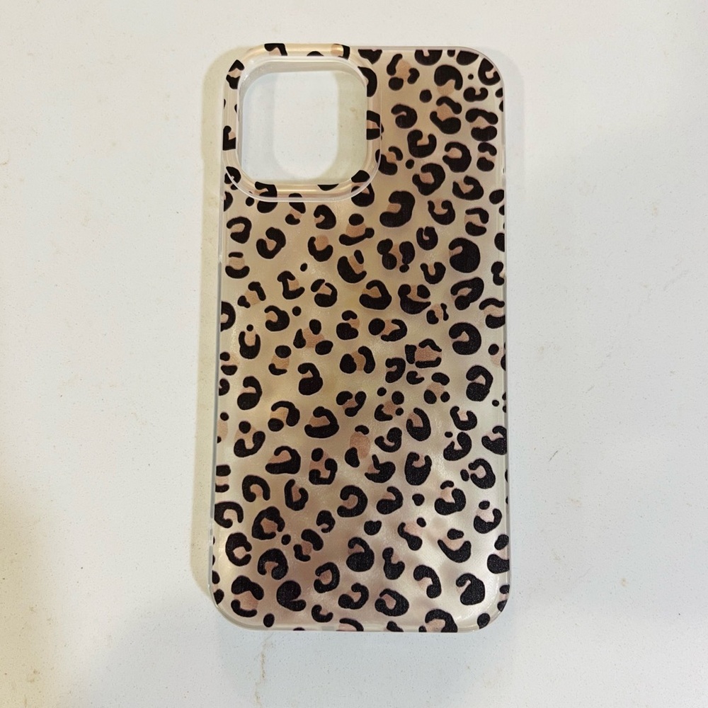 I phone 13 pro max case. Comes with credit card covers that match.